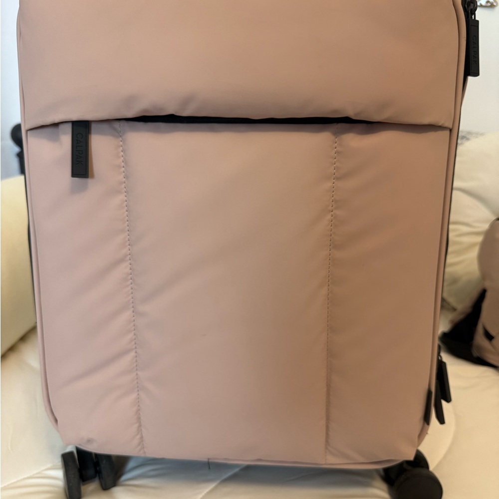 Calpak luggage Carry on used less than 5 times.  Rose quartz.